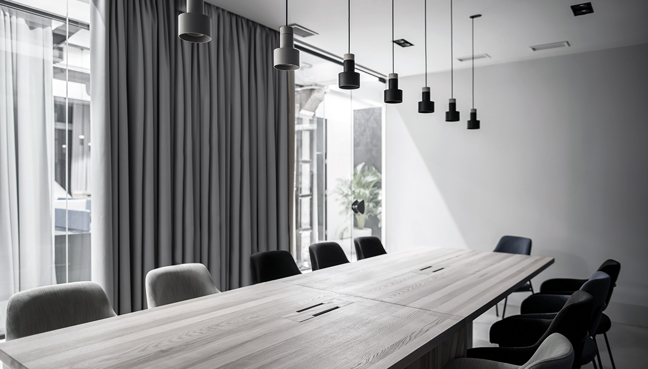 Black-out curtains, ideal for a meeting room.